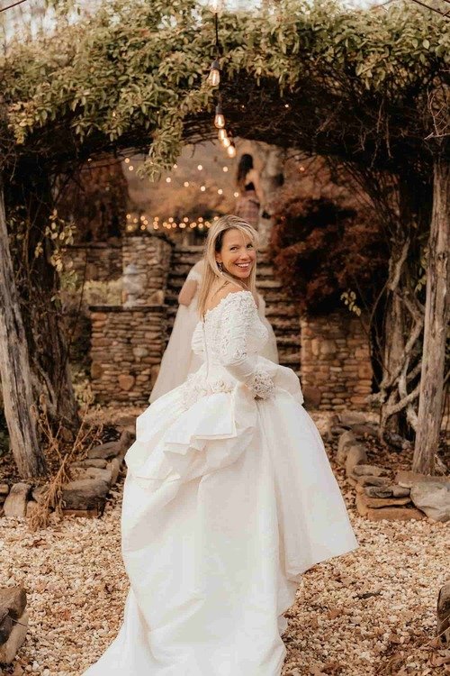 Bride walking under alter at Georgias luxury wedding venue